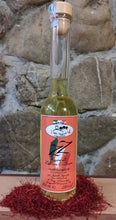 Load image into Gallery viewer, Bottiglia di liquore artigianale Torre Memoriola, aromatizzato con zafferano e zenzero, con note speziate e rinfrescanti, ideale come digestivo o per cocktail creativi.
